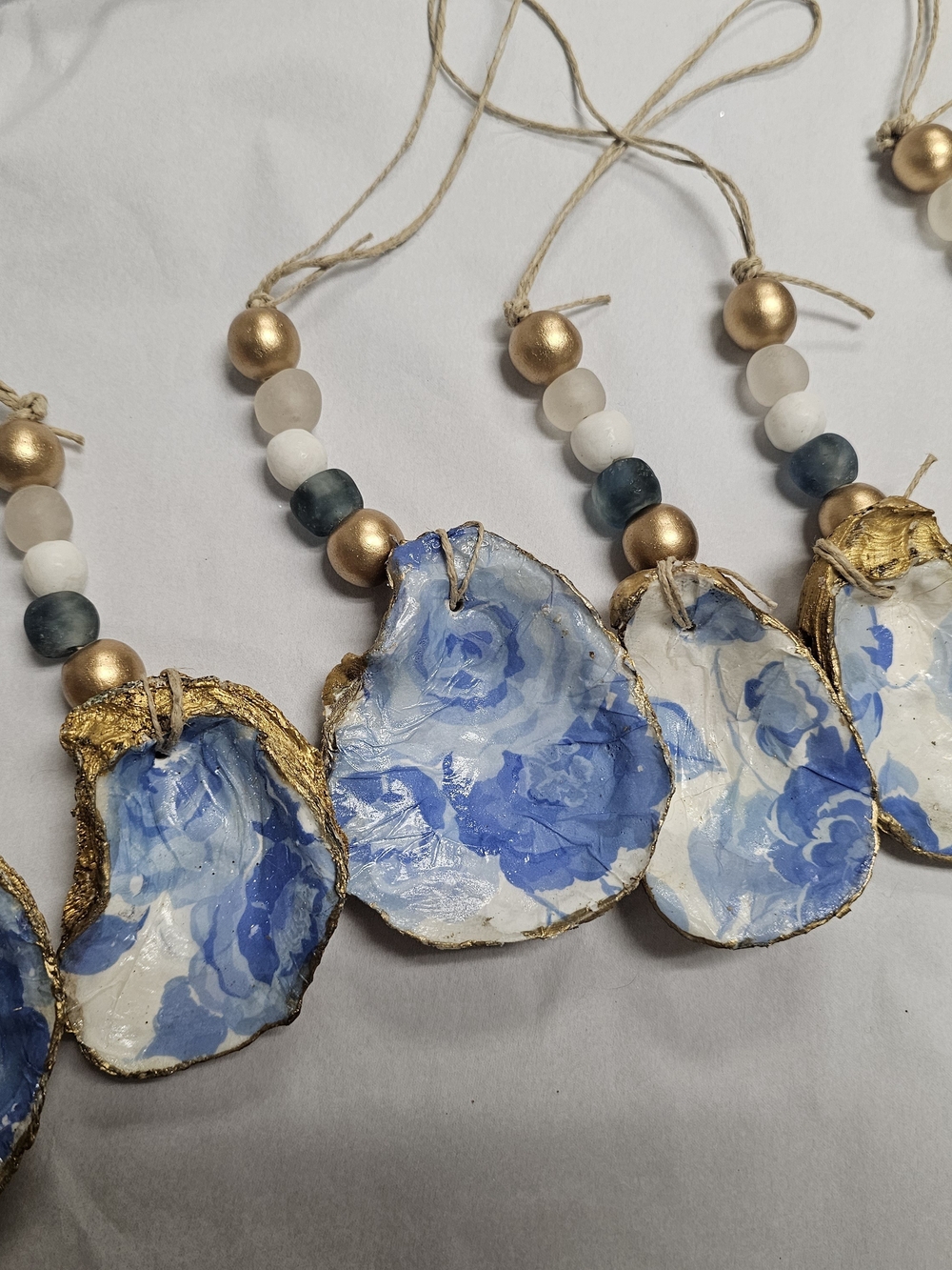 Handpainted & Decoupaged Blue Floral Shell Ornaments with Gold Accents